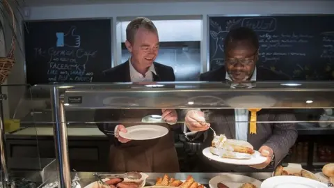 PA Tim Farron with Lib Dem candidate Ade Adeyemo in Solihull