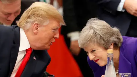 Reuters Donald Trump speaking to Theresa May in November 2018