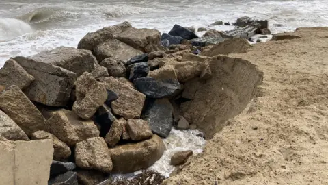 Jenny Kirk/BBC The area of beach at Hemsby where 3m to 4m has been lost to the sea