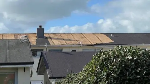 BBC A damaged roof