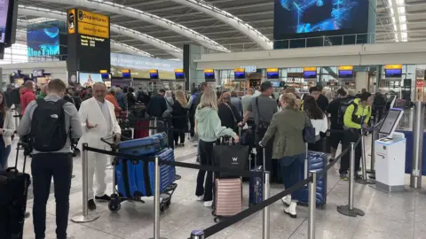 Shutterstock A busy Terminal 5 Heathrow Airport - 31 May 2022