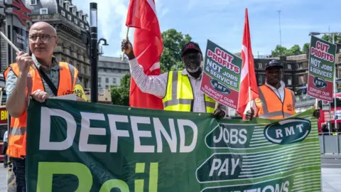 Getty Images RMT union members picket in June 2022