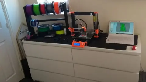 Adam Dengel The 3D printer at the family home in Barnsley