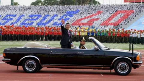 AFP via Getty Images Hun Sen