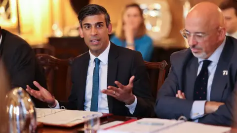 UK Gov PM Rishi Sunak and former Tory chairman Nadhim Zahawi