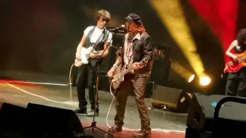 PA Media Jeff Beck and Johnny Depp on stage at Royal Albert Hall - 30 May