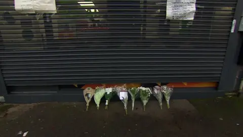 Flowers left outside the Royal Grill House