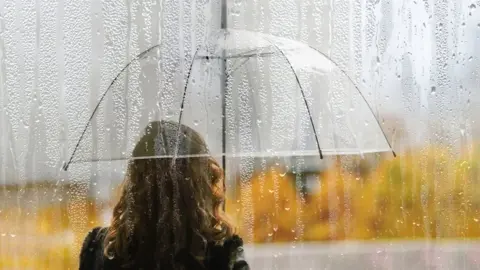 Woman in rain