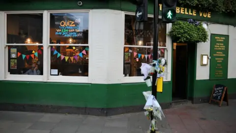 PA Media flowers near Belle Vue pub