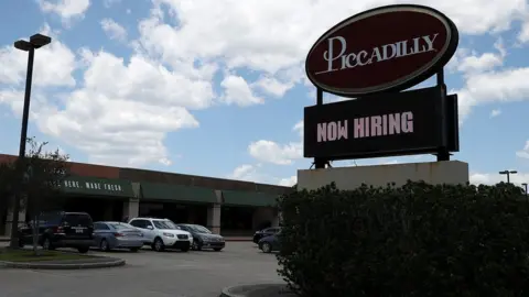 Getty Images A now hiring sign is posted in front of a Picadilly restaurant on May 5, 2017 in Baton Rouge, Louisiana.