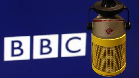 Getty Images A microphone in front of the BBC logo