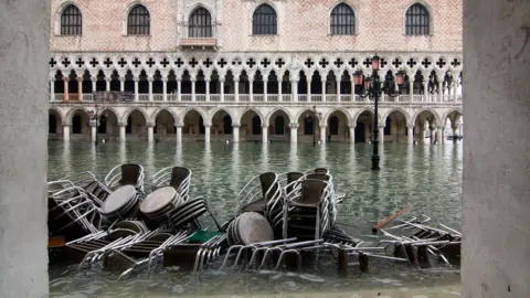 Getty Images St Mark's Square in Venice covered in water during an exceptional high tide, 13 November 2019