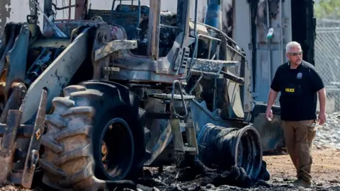 EPA Officers investigate burnt equipment