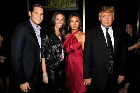 Getty Images The author and her husband on left pictured at a 2008 fundraiser gala with the Trumps