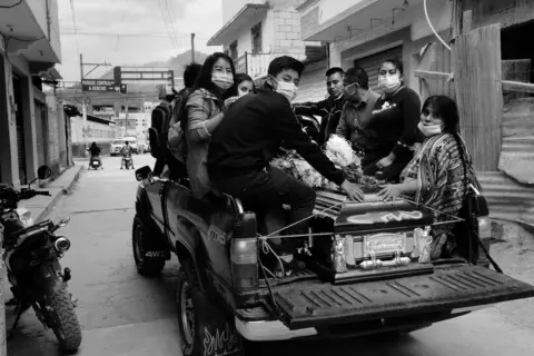 James Rodriguez Family members of Francisco Toma leave with a coffin holding the skeletal remains Mr Toma 39 years after his disappearance. Nebaj, Quiche, Guatemala. February 10, 2021.