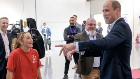 PA Media The Prince of Wales talks with Jess Bryden,