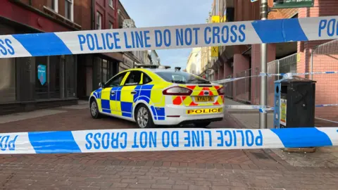 John Fairhall/BBC Westgate St in Ipswich cordoned off