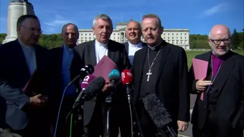 BBC church leaders stand outside Stormont House