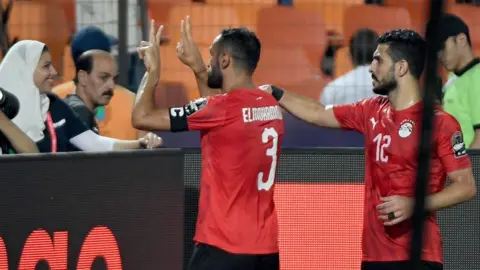AFP Team captain Ahmed Elmohamady displays the number 22 in support of Amr Warda