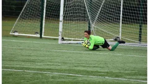 Rachael Mutch Picture of Rachel saving a goal