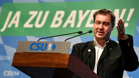 Getty Images Markus Söder at Munich rally, 11 Oct 18