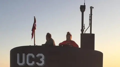 Ritzau Foto Peter Madsen next to Kim Wall on submarine