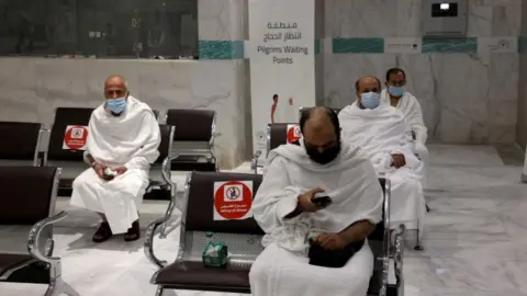 Reuters Muslims arrive at Al-Zaidi station to be taken to the Grand Mosque, ahead of the annual Haj pilgrimage, in the holy city of Mecca, Saudi Arabia