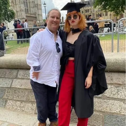 Charlotte Eyres Charlotte and Jonathan Eyres at Charlotte's graduation