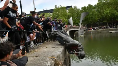 PA Media Colston statue lowered into Bristol harbour