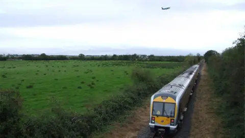 Robert Gardiner The Knockmore line passing Belfast International Airport