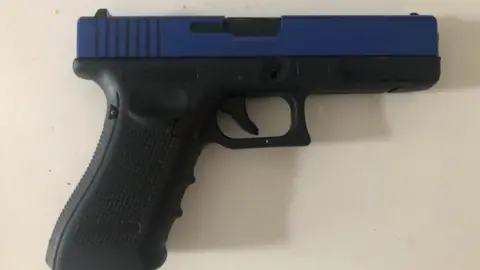 Mina Agyepong Toy gun