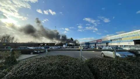 Smoke from a fire at a recycling centre