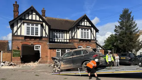 Charlie Jones/BBC Damaged caused to the Strangers Home pub in Bradfield