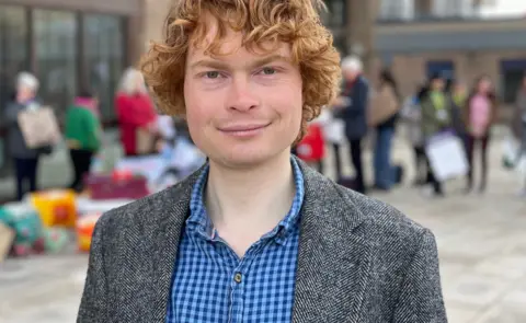 Shaun Whitmore/BBC Jamie Osborn, from the Green Party, outside County Hall in Norwich