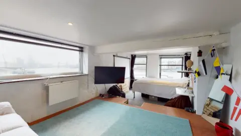 Savills The house has multiple bedrooms and spaces for different uses