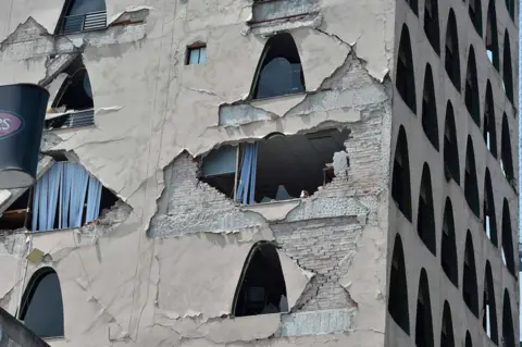 AFP A damaged multi-storey building in Mexico City, 19 September