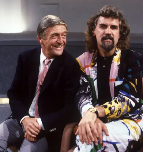 ITV/Shutterstock Sir Michael Parkinson with Sir Billy Connolly on Parkinson - One to One in 1987