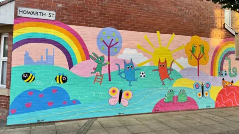 Lynda Sterling - OT Creative Space Melanie Williamson's mural Can You Kick It?