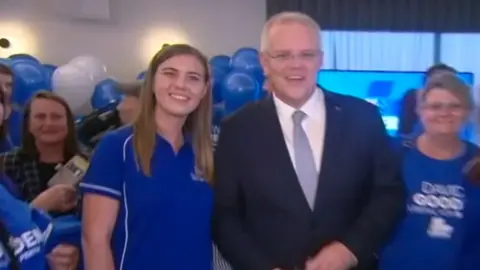 ABC Ms Higgins, pictured here with Prime Minister Scott Morrison during a party fundraiser