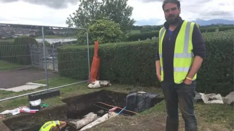 Archaeologist Brian Sloan at the excavation site at Down Cathedral