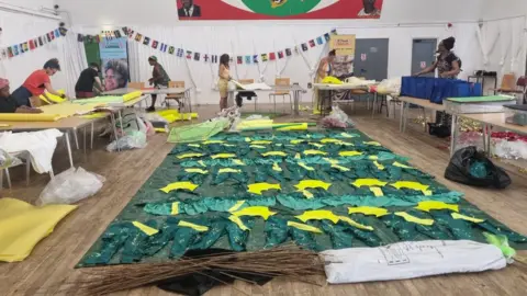 PurpleFish A lot of colourful costumes being laid out