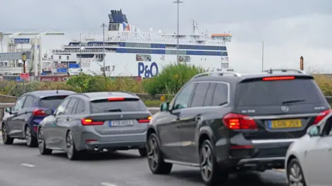 PA Media Cars queuing at Dover in July 23