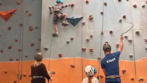 Rock climbing in action