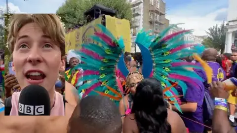 Reporter Jamie Moreland on the streets of Notting Hill Carnival