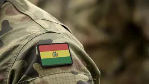 Getty Images The Bolivian flag on a military uniform