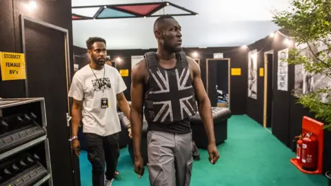 Tawbox Stormzy walking on stage