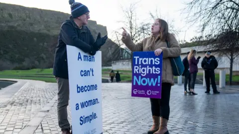 PA Media campaigners for and against the gender reform bill