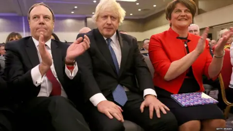 Getty Images Nigel Dodd, Boris Johnson and Arlene Foster