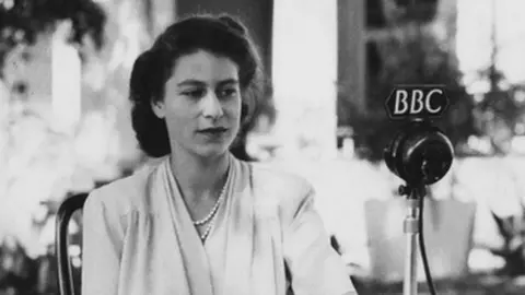 Getty Images Princess Elizabeth makes a broadcast from the gardens of Government House in Cape Town, South Africa, on the occasion of her 21st birthday