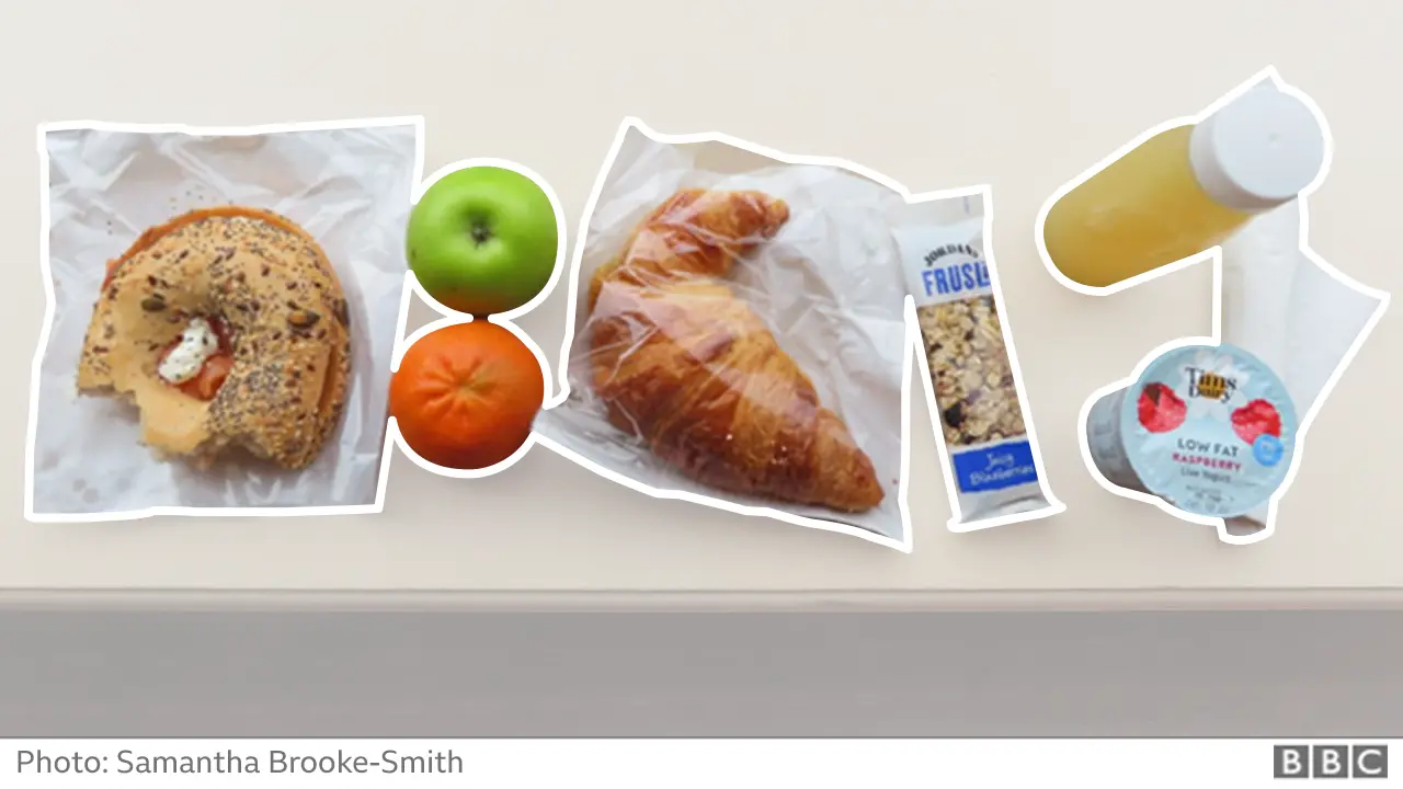 Breakfast - bagel, croissant, yoghurt cereal bar and fruit